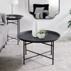 Table basse ronde en métal avec piètement géométrique, doré et blanc